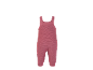 Barboteuse bébé tricotée de couleur rose unie avec bretelles.