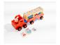 Un camion rouge Peppa Pig avec des blocs et des figurines.