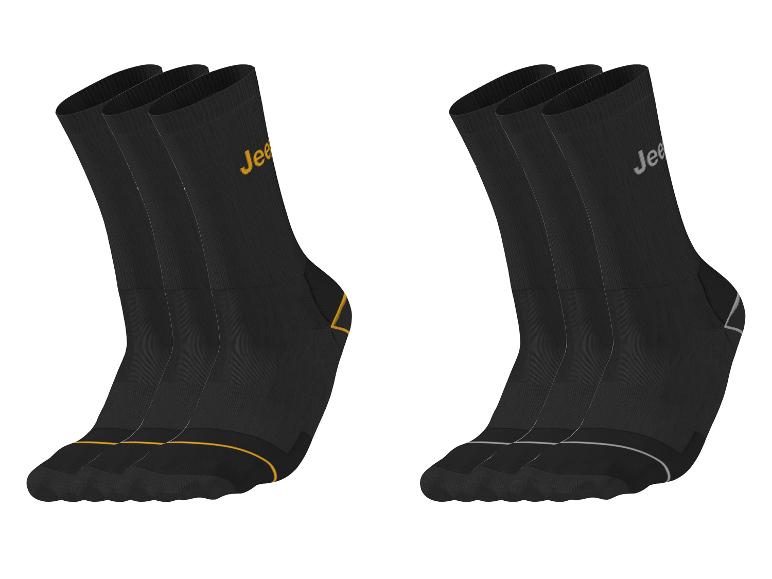 Six chaussettes Jeep noires, trois avec des accents jaunes et trois avec des accents gris.