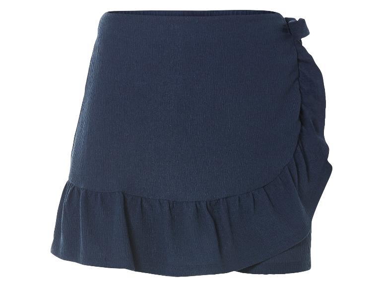Jupe courte bleu marine à volants, style wrap.