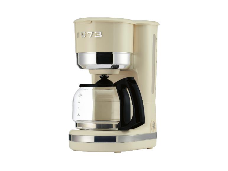 Cafetière rétro crème avec le texte « 1973 » et une carafe de 10 tasses.