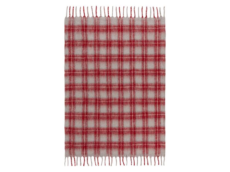 Une couverture en flanelle à carreaux rouges et gris.