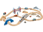 Ensemble de train en bois avec rails, véhicules et monuments emblématiques du monde.