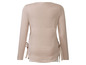 Pull beige à manches longues avec des lacets sur les côtés.
