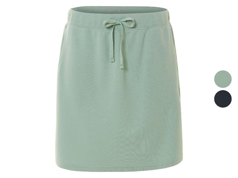 Jupe courte en molleton, coupe décontractée, disponible en vert clair et noir.