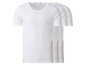 Trois t-shirts blancs à manches courtes.