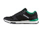 Basket Parkside noires avec des accents verts.