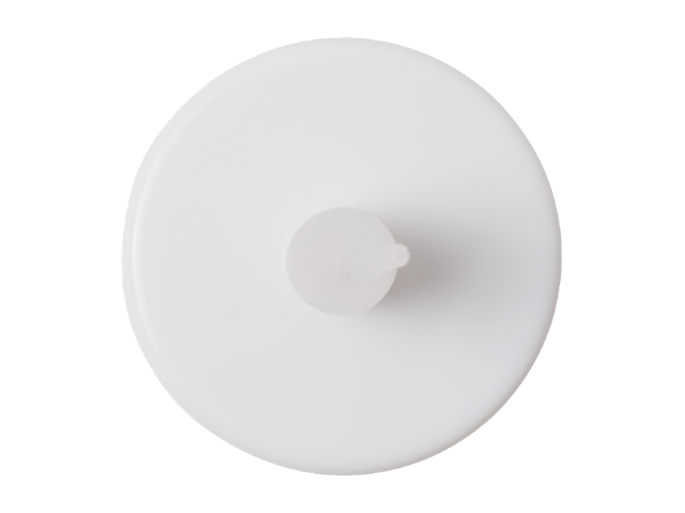 Couvercle rond blanc avec un petit bec central, vu de dessus.