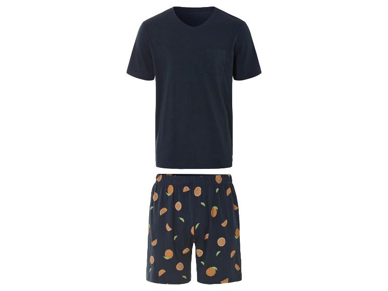 Pyjama homme : t-shirt et short à motif oranges.