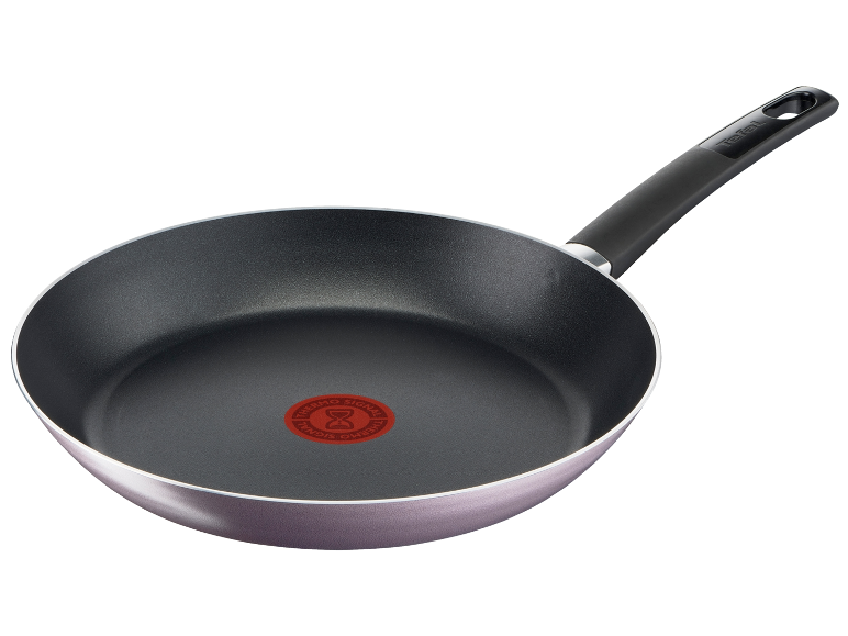 Poêle à frire en aluminium avec revêtement antiadhésif et indicateur de chaleur.