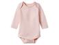 Body bébé rose clair à manches longues avec fermetures à pression.