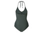 Un maillot de bain vert foncé avec un décolleté halter.