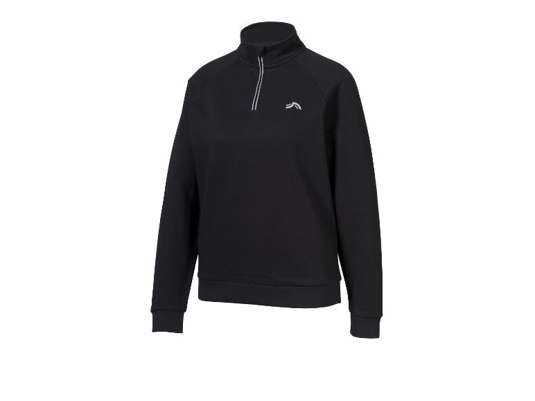 Haut d'entraînement noir avec fermeture éclair et logo sur la poitrine.