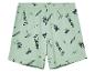 Shorts vert pâle à motifs phares, palmiers et planches de surf.