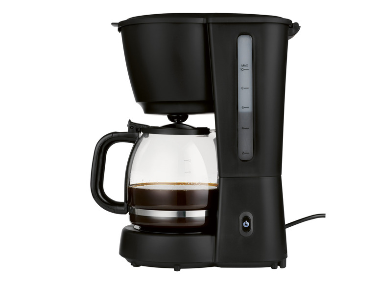 Une cafetière noire avec une carafe en verre remplie de café.