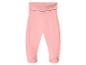 Pantalon de bébé rose avec pieds intégrés et taille élastique large.
