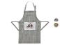 Tablier de cuisine à carreaux avec motif floral.