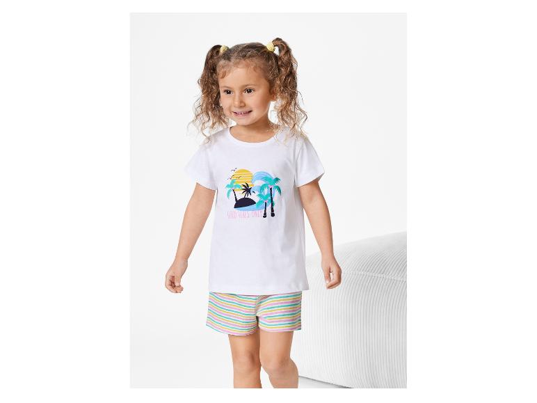 Pyjama enfant avec t-shirt blanc à imprimé tropical et short rayé.