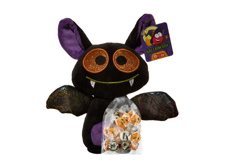 Peluche de chauve-souris d'Halloween avec un sachet de bonbons.