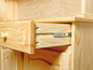 Une armoire en bois avec un tiroir ouvert