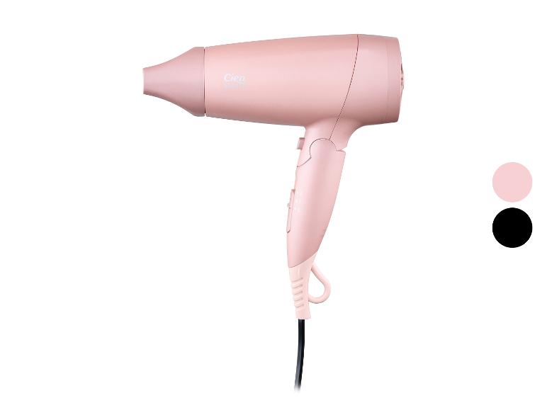 Sèche-cheveux rose avec des détails noirs et un sélecteur de couleur.