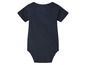 Un body bébé bleu marine à manches courtes.