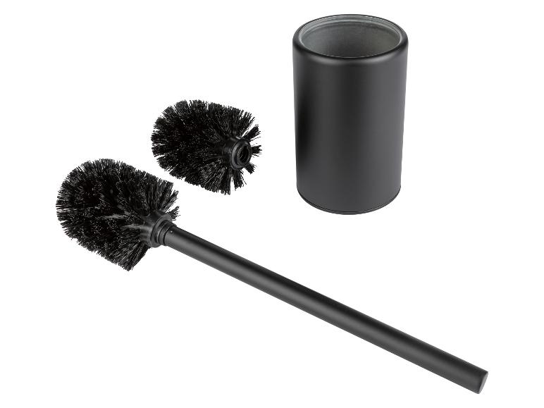 Ensemble brosse et support WC noirs.