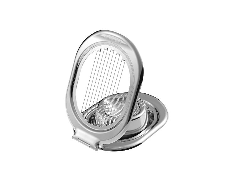 Coupe-œufs métallique brillant avec base et fils de coupe.