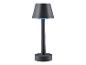 Une lampe de table noire avec un abat-jour rond.