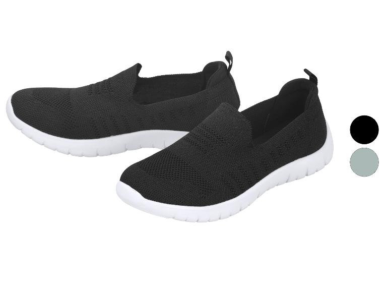 Chaussures de sport slip-on noires pour femmes avec semelles blanches, également disponibles en gris.