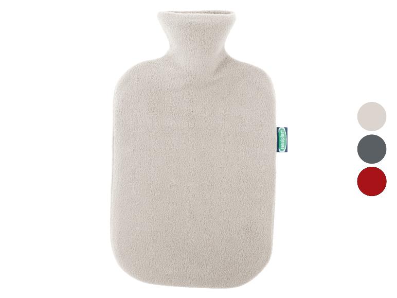 Une bouillotte en polaire beige avec l'étiquette Sensi Plast
