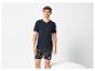 Pyjama homme : t-shirt noir et short imprimé agrumes.