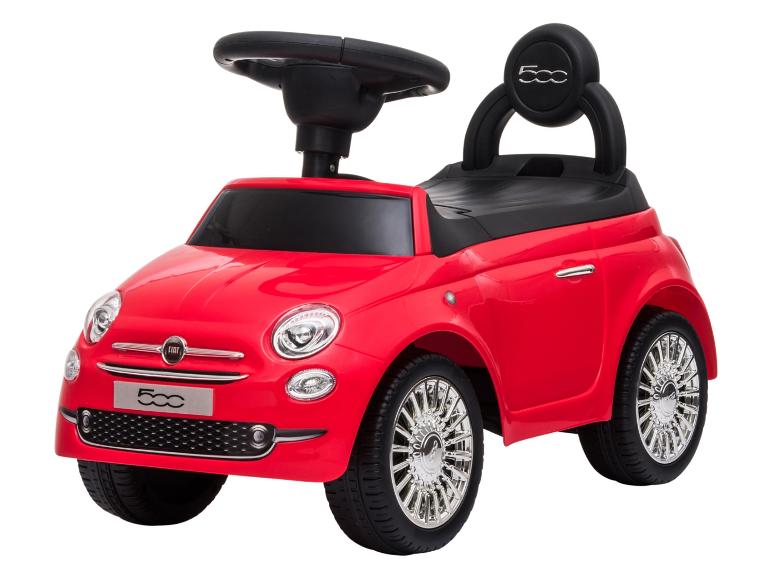 Voiture porteur rouge avec volant et siège noirs, avec des roues chromées.