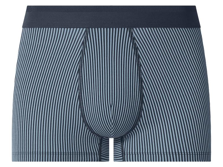 Caleçon boxer rayé pour homme en bleu et noir avec une ceinture bleu foncé.
