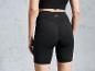 Short de yoga noir avec le logo 'Gym Shark'.