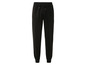 Pantalon de survêtement noir avec ceinture élastique.