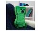 Coussin Minecraft Creeper sur un fauteuil.