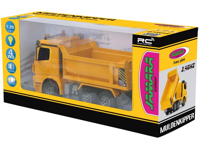 Camion-benne jouet jaune radiocommandé dans sa boîte.