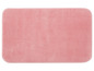 Un tapis de bain rose.