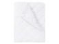 Couette blanche avec motif matelassé