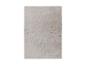 Tapis rectangulaire beige avec motif ondulé en relief.
