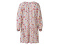 Une robe blanche à manches longues avec un motif floral.