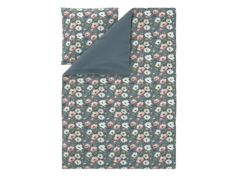 Parure de lit florale avec des fleurs roses et blanches sur fond sarcelle