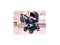BAYER DESIGN Poussette combinée pour poupées Xeo Deluxe Set bleue et rose à motifs étoiles dans une chambre d'enfant