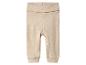 Pantalon bébé beige avec taille élastique et revers aux chevilles.