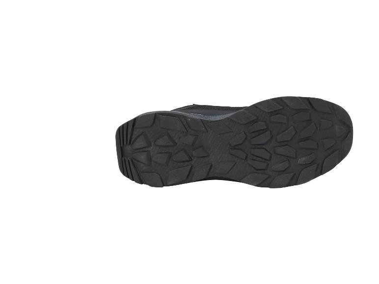 Semelle de chaussure de sport noire avec motif adhérent