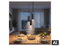 Suspension LED BRILONER au-dessus d'une table à manger dressée dans un salon chaleureux [image générée par l'IA]