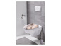 Des toilettes avec un siège de toilette en marbre, une brosse de toilette et un porte-papier toilette.