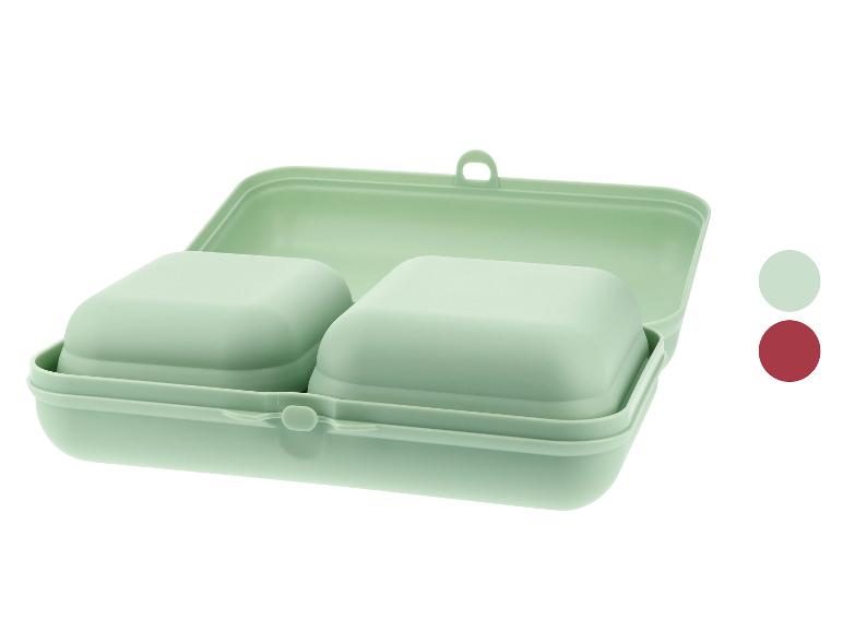 Boîte repas verte pâle avec deux compartiments.