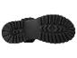 Semelles de chaussures noires, détail de la semelle crantée.